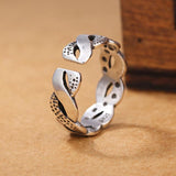 Intertwined water ripples ring